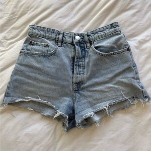 Zara high-rise, light wash denim cut-off shorts with a raw hem